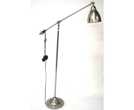 A contemporary metal floor lamp with adjustable reading light, height circa 148cm