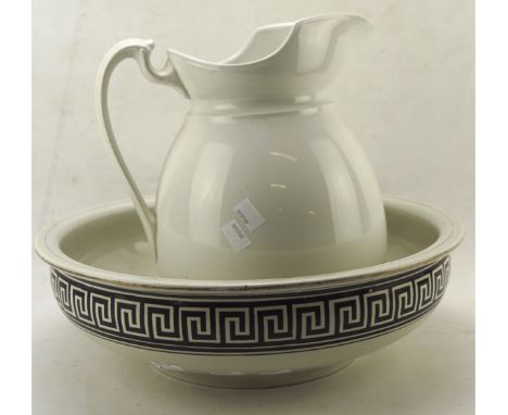A matched ceramic wash bowl and basin, the basin adorned with Greek key pattern decoration to its border
