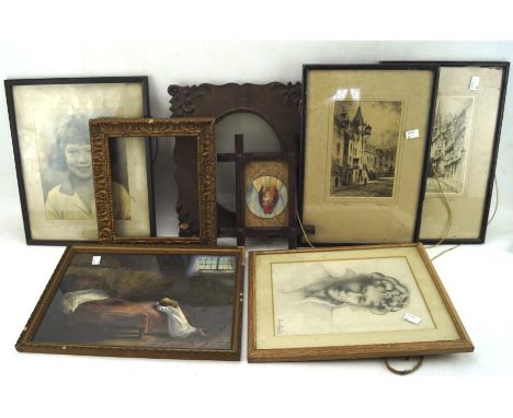 A group of vintage pictures and frames including etchings of city scenes, a drawing of a lady, and more, mostly framed and gl