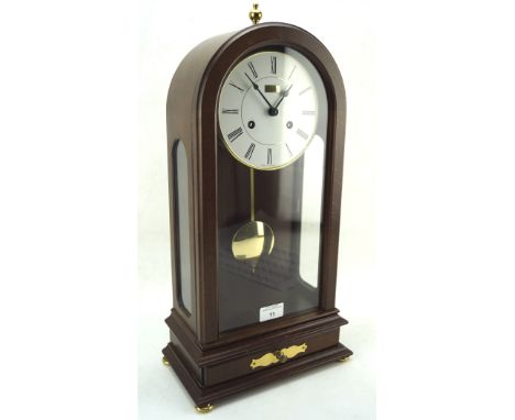 A 20th century German Angelus mahogany cased mantle clock with Roman numerals to the enamel face denoting hours, lower drawer