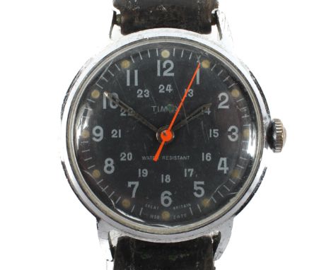 A vintage Timex wristwatch, model 1158 2470, the dial with Arabic numerals denoting hours, stainless steel case on leather st