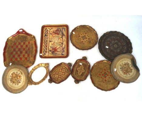 A selection of assorted trays, to include papier mache examples., with gilt detailing, a metal tray with enamel decoration an