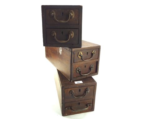 Three vintage wooden tool boxes, each with two drawers, some with compartments to the inside, with some tools, each box measu