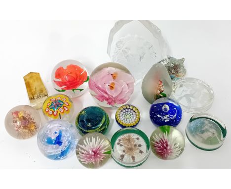 A collection of 17 paperweights, of cut glass and floral designs, together with flat pictorial pieces.