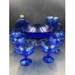 A selection of cobalt blue glassware to include bowls, glasses etc.