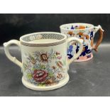 Two reproduction cider mugs