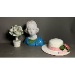 A selection of painted ceramics to include a bust of a lady a summer hat and a tree with birds,