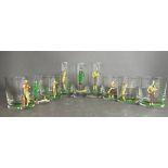 A selection of golf items novelty glassware