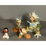 Five bird ornaments