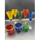 A selection of coloured glass to include six flutes.