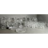 A selection of golfing glassware to include decanters trophies and tankards