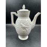 A creamware coffee pot with bird pattern