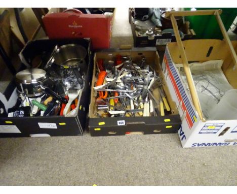 Two boxes of kitchen cutlery and a box of household lighting etc