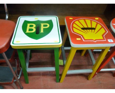 Pair of square wooden stools with painted BP and Shell emblem