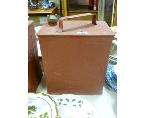 Red coloured vintage Esso petrol can
