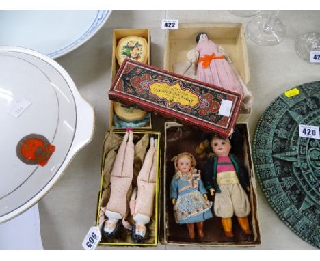 Three dressed vintage dolls, two porcelain head vintage dolls and a fancy box of soaps