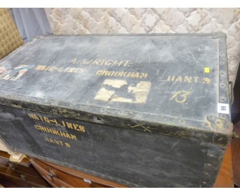 Black travel trunk with metal edging and inscribed 'A Wright'