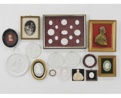 A wax tassie portrait of Mrs Arth Stewart, Edin 1797, 7cm tall, framed, together with a number of plaster medallions, bisque 