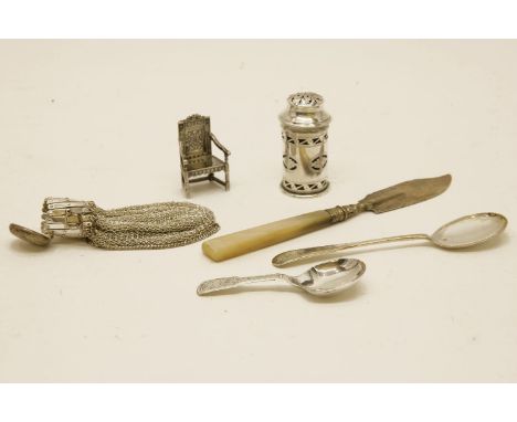 A silver miniature armchair, a small peppette, caddy spoon, preserve spoon, a silver plated purse