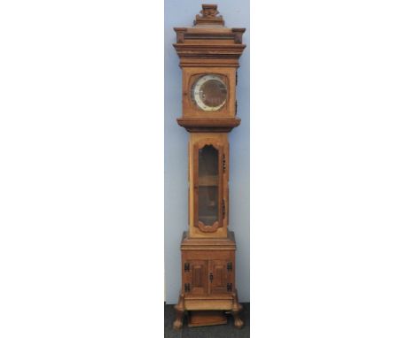 An early 20th century Continental walnut and oak long case clock, approximately 185cm tall