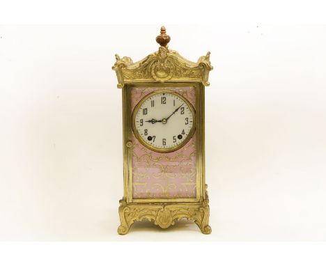 A gilt metal and ceramic panel mantle clock