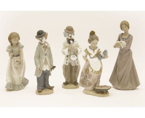 Three Lladro porcelain figures, together with two Nao figures