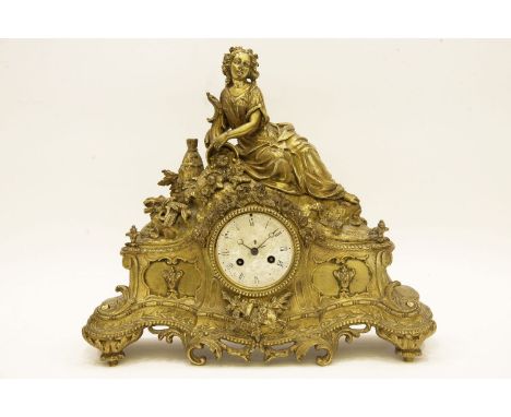 A French design gilt metal mantel clock, with figural surmount