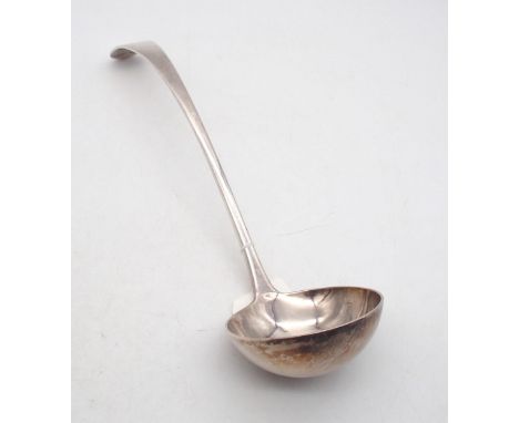 An Edwardian silver soup ladle, in the Old English pattern, by Josiah Williams &amp; Co, London 1909, 32cm, 306gms Condition 