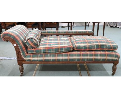 A Victorian mahogany framed chaise longue with spindle supports back on turned supports terminating in ceramic casters, 78cm 