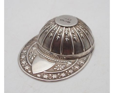 A novelty Elizabeth II silver caddy spoon, by Laurence R Watson &amp; Co, Birmingham 1994, in the form of a jockey's cap, wit