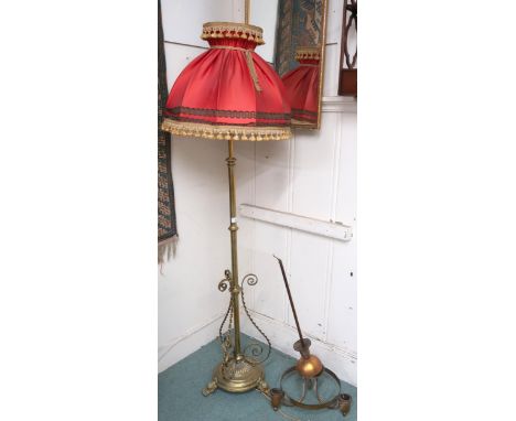 A 19th century brass adjustable standard lamp converted to electric with scroll decoration to three footed circular base, 170