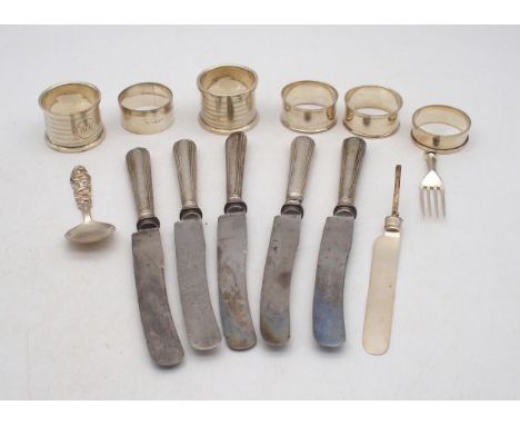 A collection of silver including a Danish silver caddy spoon, by Brodrene Mylius, assorted silver napkin rings, a set of five