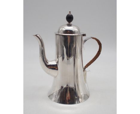 A George V silver coffee pot, by Asprey London, of flaring cylindrical form, the domed lid with an oval finial, with a wicker