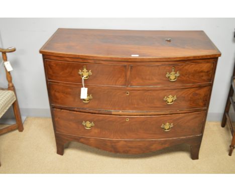 A Georgian mahogany bowfront chest of two short and two long drawers, on splayed bracket feet, 104 x 53 x 80cms high.