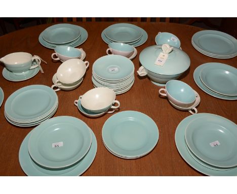 Poole Twintone dinner service for ten people, comprising: plates, soup bowls, saucers, and a tureen.