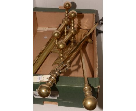 A box of brass fireside tools; and a pair of brass andirons.