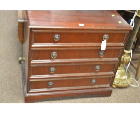 A 20th Century mahogany chest of drawers, fitted an arrangement of four long drawers, raised on bracket feet, 72 x 75 x 45cms