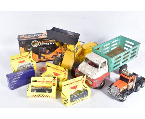 A BOX CONTAINING LARGE VINTAGE MODEL TRUCKS, to include a Tonka Turbo Diesel construction tinplate vehicle, painted yellow, w