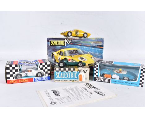 FOUR BOXED SCALEXTRIC RACING CARS, B.R.M. F1 car, No.C/72, green body, Mercedes-Benz 190SL, No.C/75, light blue body, white i