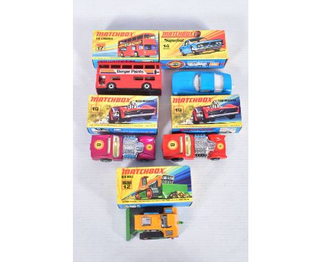 FIVE BOXED MATCHBOX AND SUPERFAST MODEL VEHICLES, to include a  Big Bull no. 12, in orange and green with black tracks, track