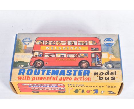 A BOXED TIN PLATE WELSOTOYS ROUTEMASTER 135 MODEL BUS, red in design with people painted in the windows, Esso adverts to each