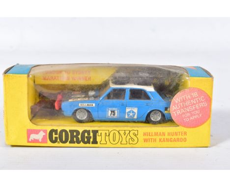 A BOXED CORGI TOYS HILLMAN HUNTER RALLY CAR, No.302, with Golden Jacks wheels, complete with Kangaroo figure, decals have bee