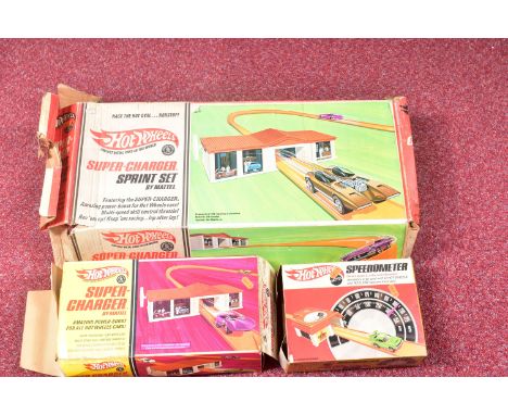 THREE VINTAGE BOXED MATTEL HOTWHEELS SETS, all boxes distressed, to include a 'Super-Charger' with a playworn vehicle inside 