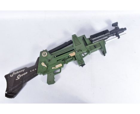 AN UNBOXED TOPPER JOHNNY SEVEN O.M.A. MULTI ACTION MACHINE GUN, plastic in design, without its missiles or ammunition, losses