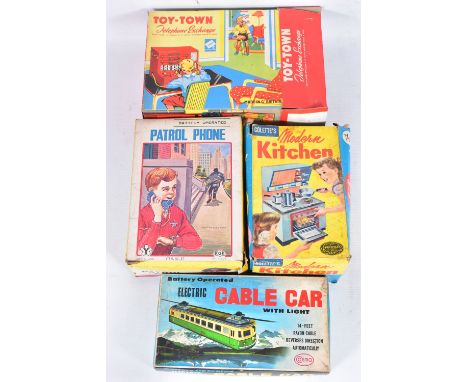 FOUR VINTAGE CHILDRENS TOYS, to include a Toy Town telephone exchange, red tinplate, discolouration to the yellow plastic and