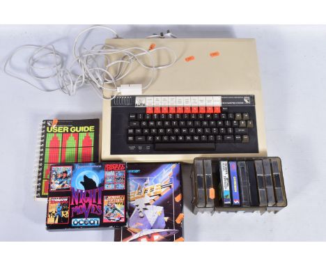 A BBC MICROCOMPUTER, MICROCOMPUTER USER GUIDE &amp; A QUANTITY OF GAMES, games include Elite, 3D Bomb Alley, Overdrive and Sn