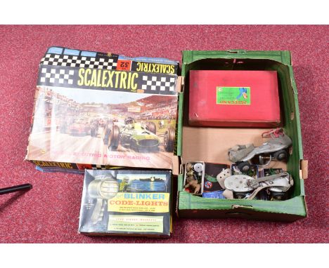 A SCALEXTRIC SET 32 BOXED RACING SET, to include three straight pieces of track, ten curved pieces, two triggers, hay bales a