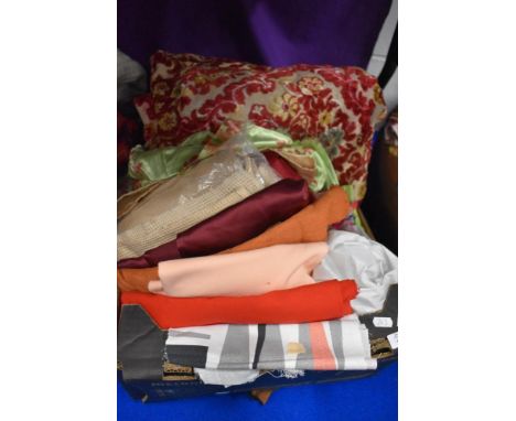 A box full of vintage and modern fabrics etc.