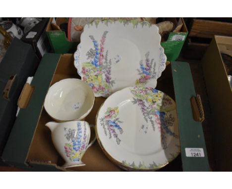 A Foley China part tea service (9 pieces approx) in a pretty cottage garden design.