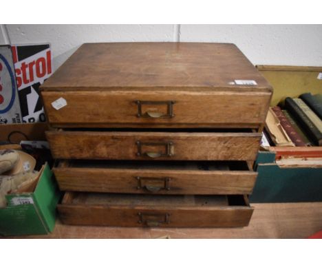 A set of vintage wooden office desk top or artists/craft drawers